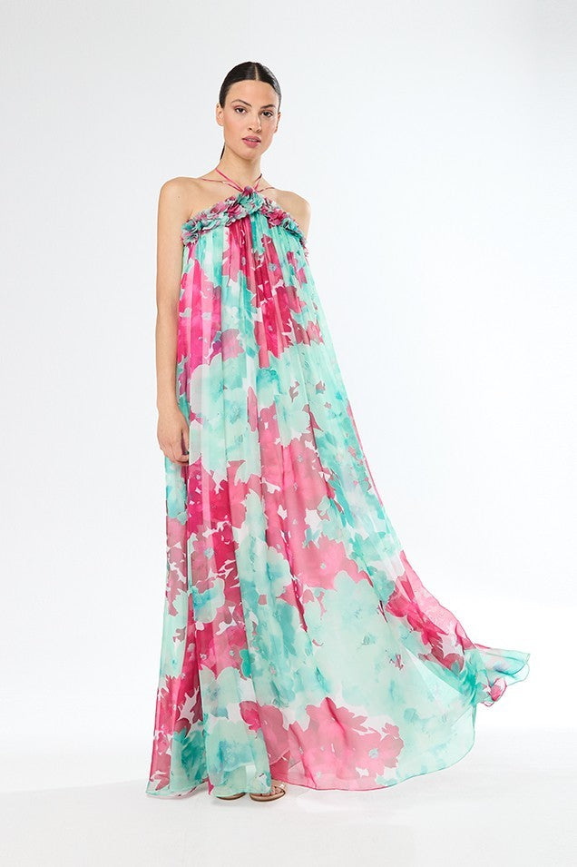 Vestido largo estampado con detalles de flores y amarre al cuello