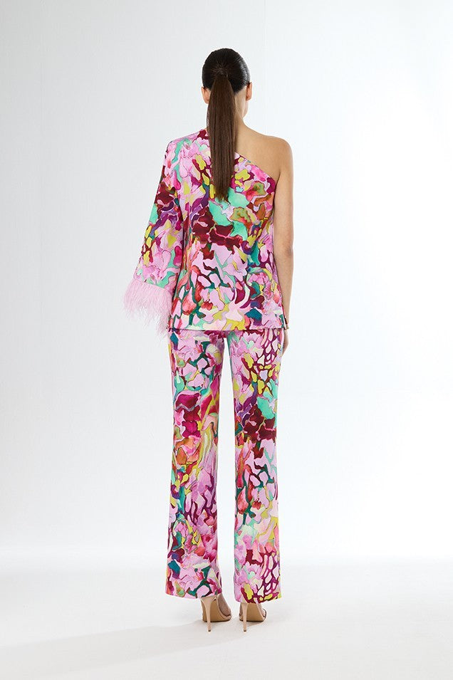 Conjunto de blusa asimétrica de una manga y pantalón largo estampado