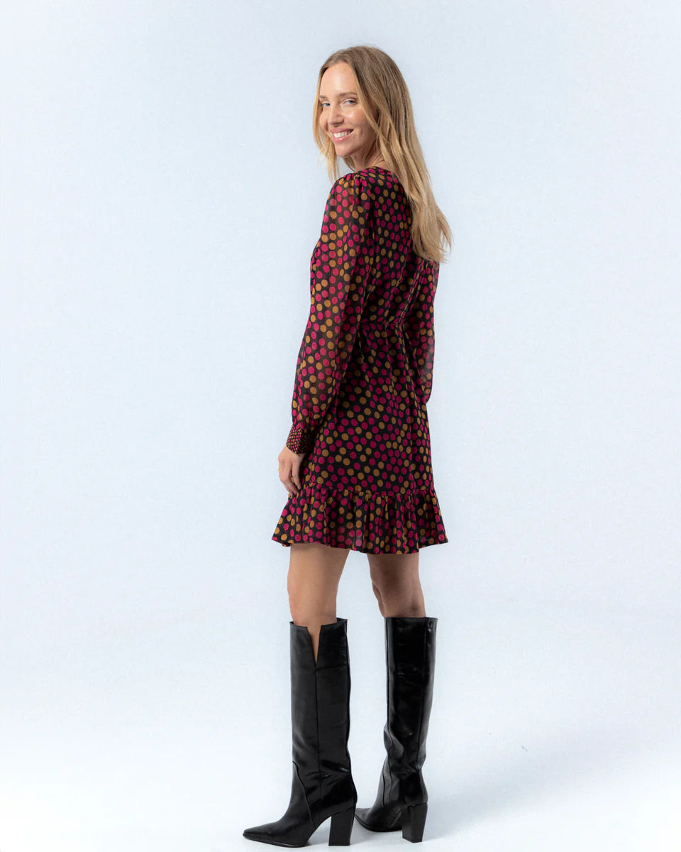 Vestido corto de escote redondo manga larga con estampado de lunares y lazada