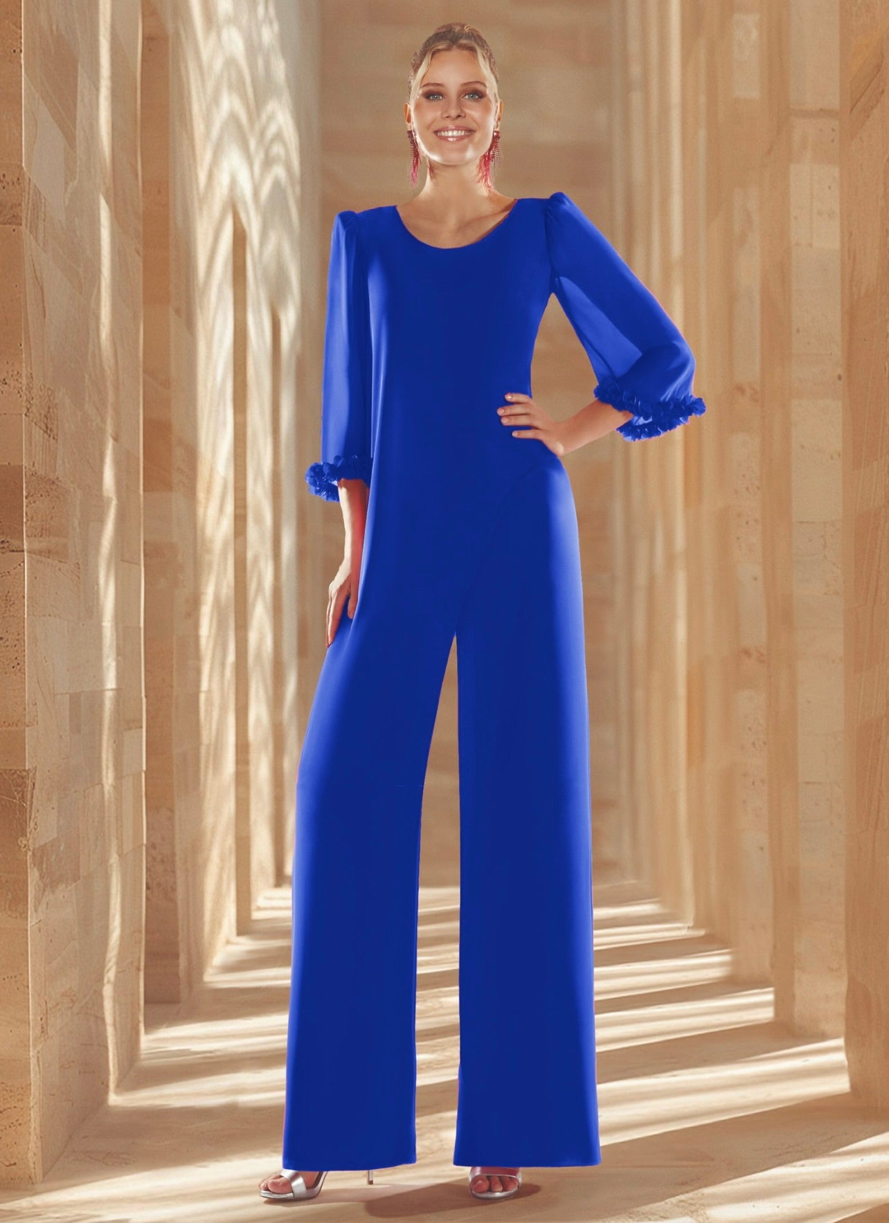 Mono largo de escote cruzado con sobrepieza de manga acampanada