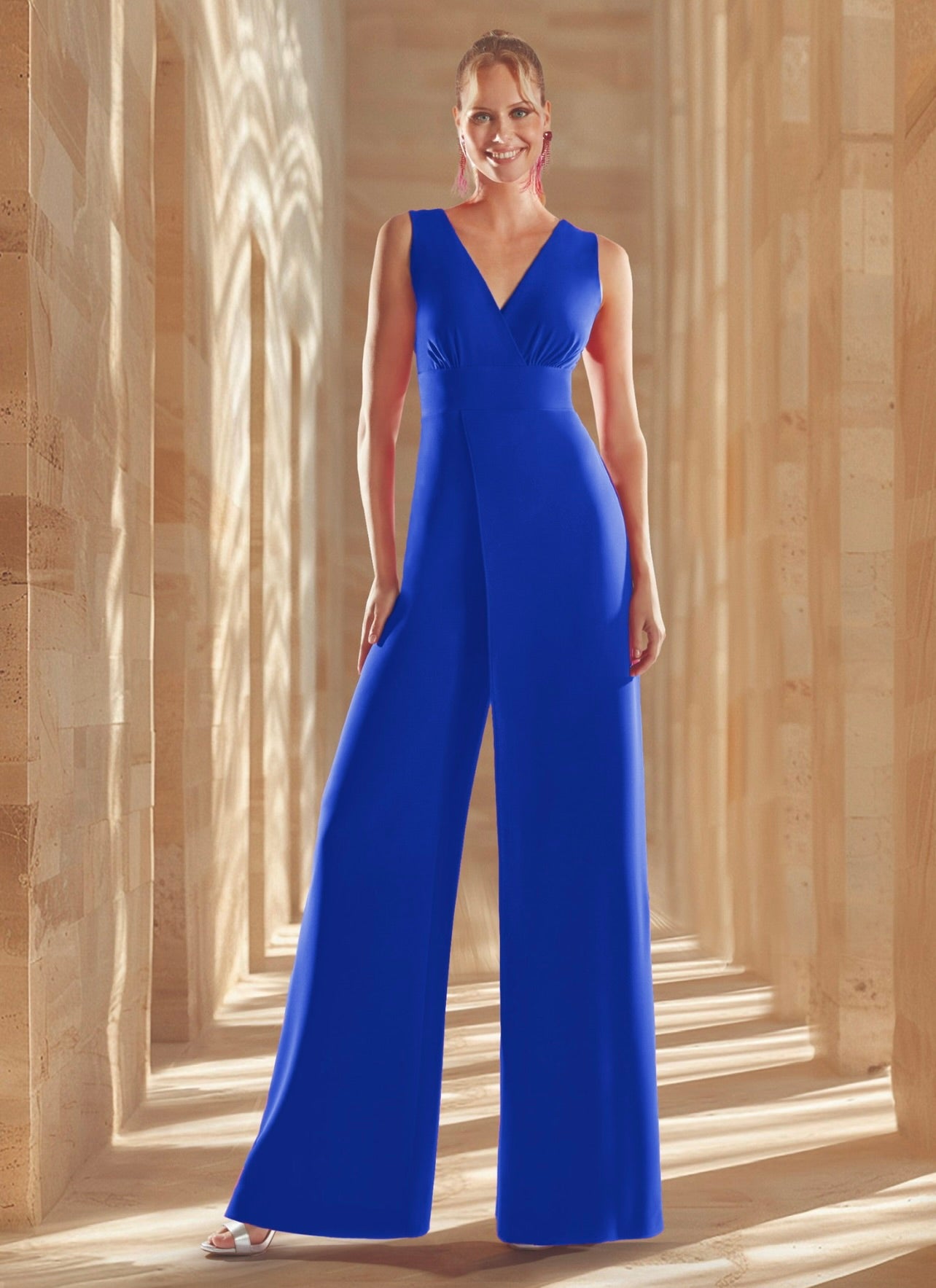 Mono largo de escote cruzado con sobrepieza de manga acampanada