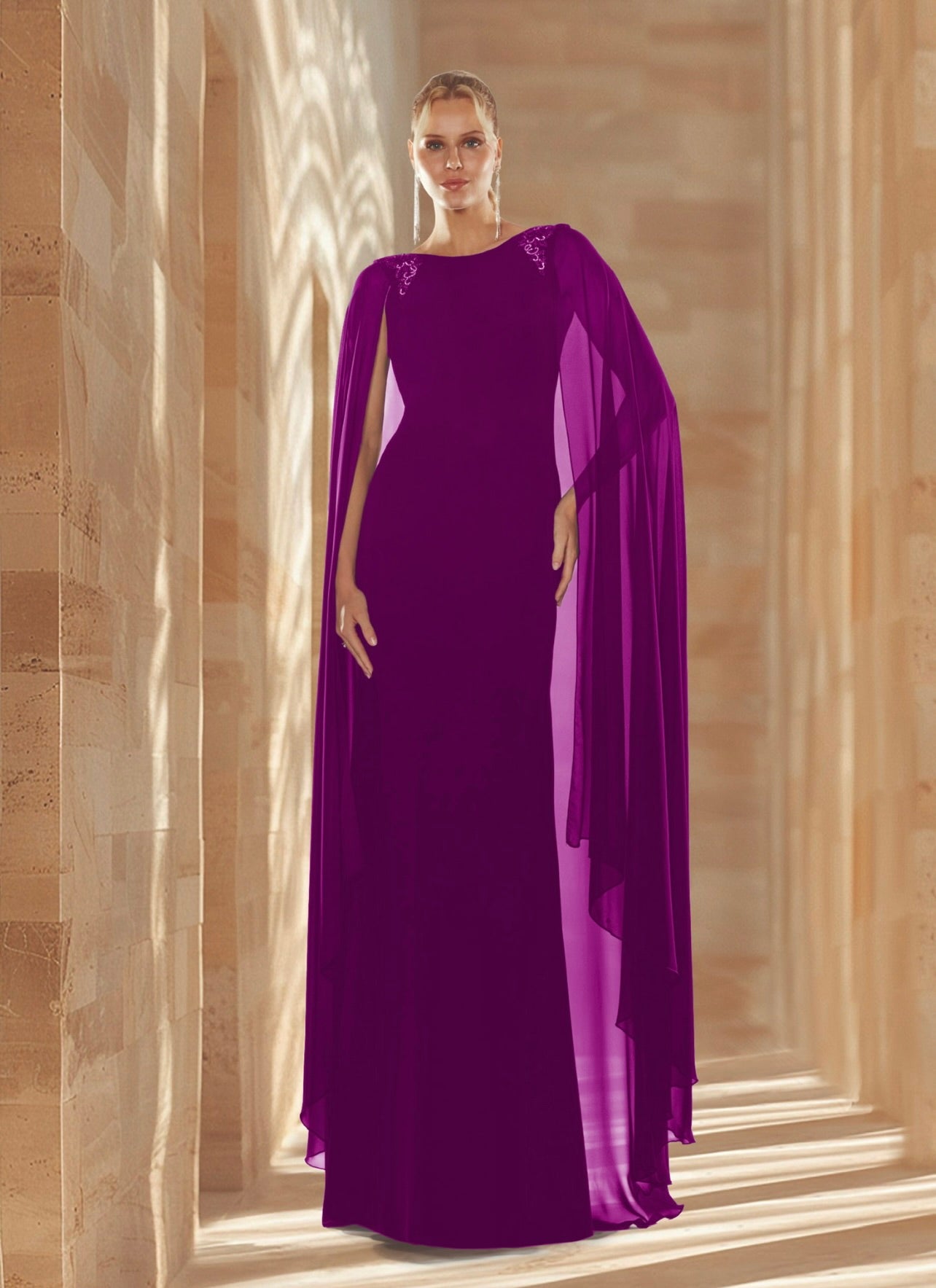 Vestido largo de pedrería en hombros con manga de capa y espalda descubierta