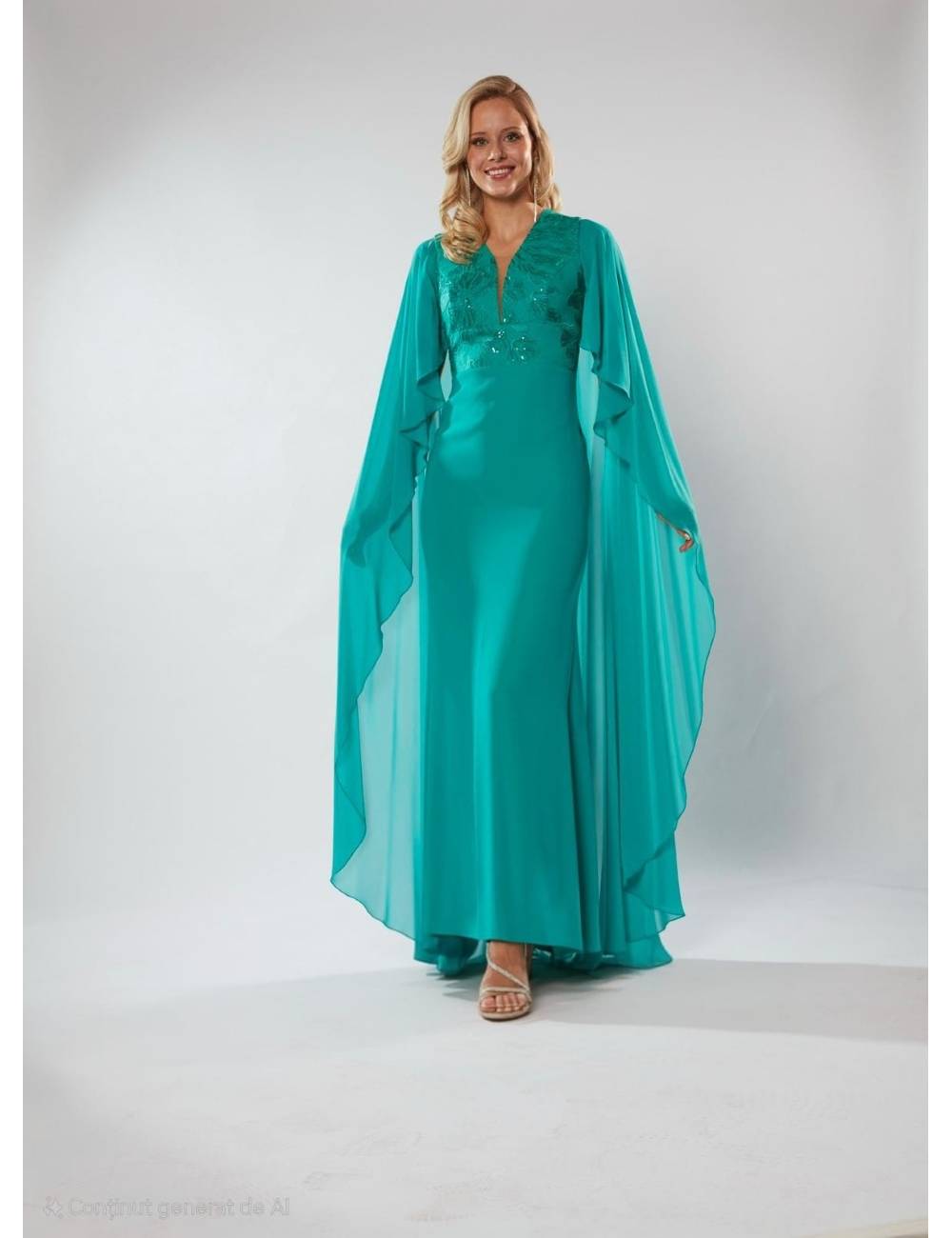 Vestido largo corte sirena de escote profundo con bordado y pedrería