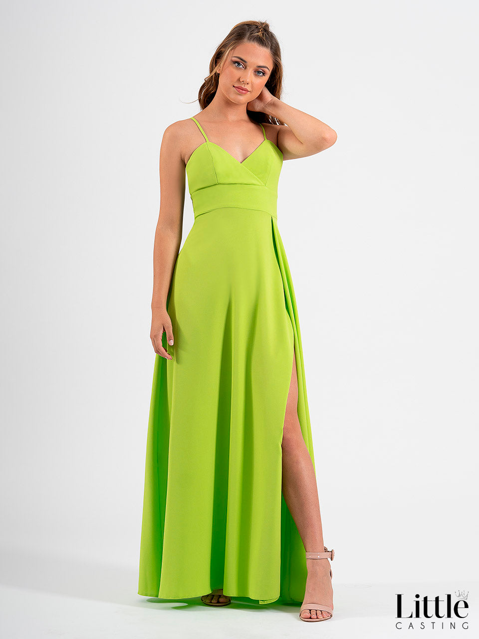 Sleeveless flared maxi dress with crossover neckline and side slit