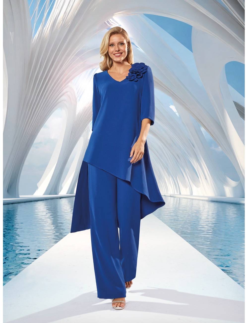 Conjunto dos piezas blusa de corte asimétrico y pantalón palazzo