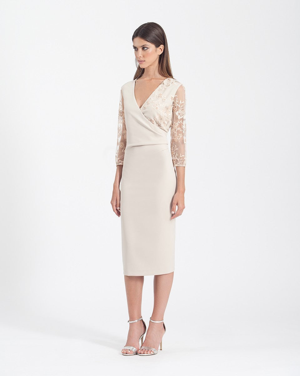 Midi tube dress with crossover neckline and embroidery on the sleeves 