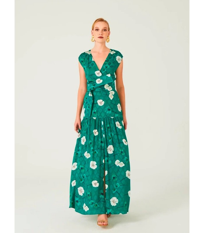 Langes Kleid mit Blumen auf grünem Hintergrund Dolores Promesass 