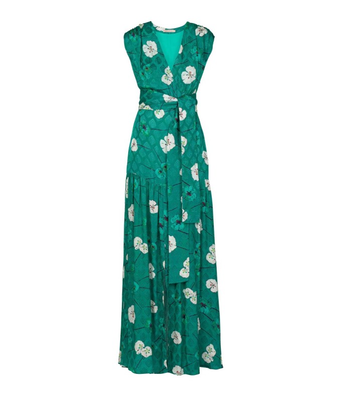 Long dress with flowers on a green background Dolores Promesass 