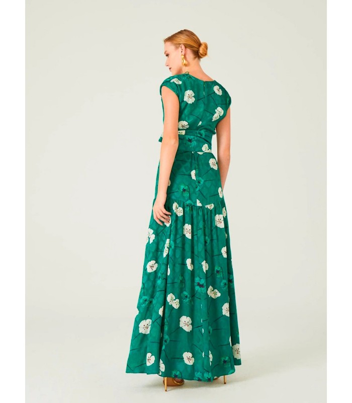 Langes Kleid mit Blumen auf grünem Hintergrund Dolores Promesass 